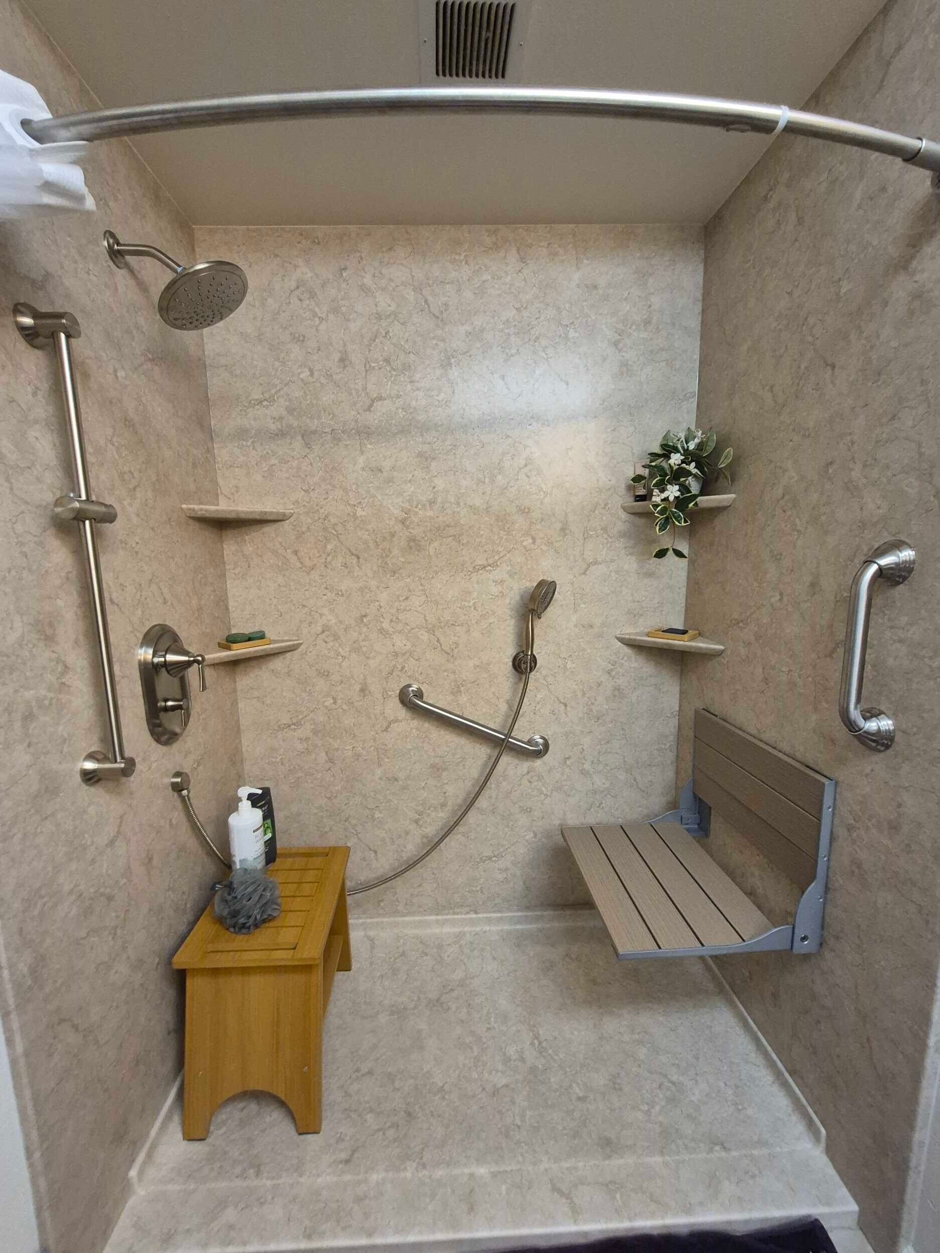 Walk in shower with a shower seat 